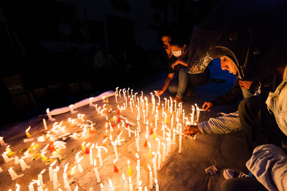 A candlelight vigil for those who perished in the earthquake.